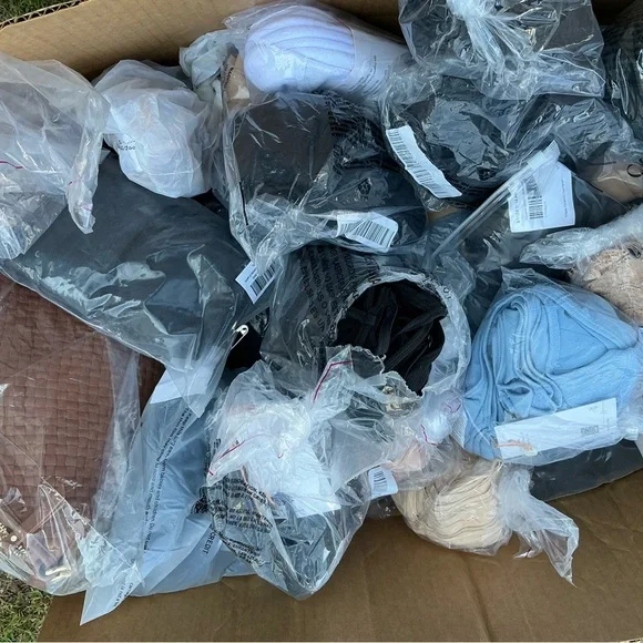 Quince Clothing Collection in Black, Blue, and Beige - Picture 4 of 4